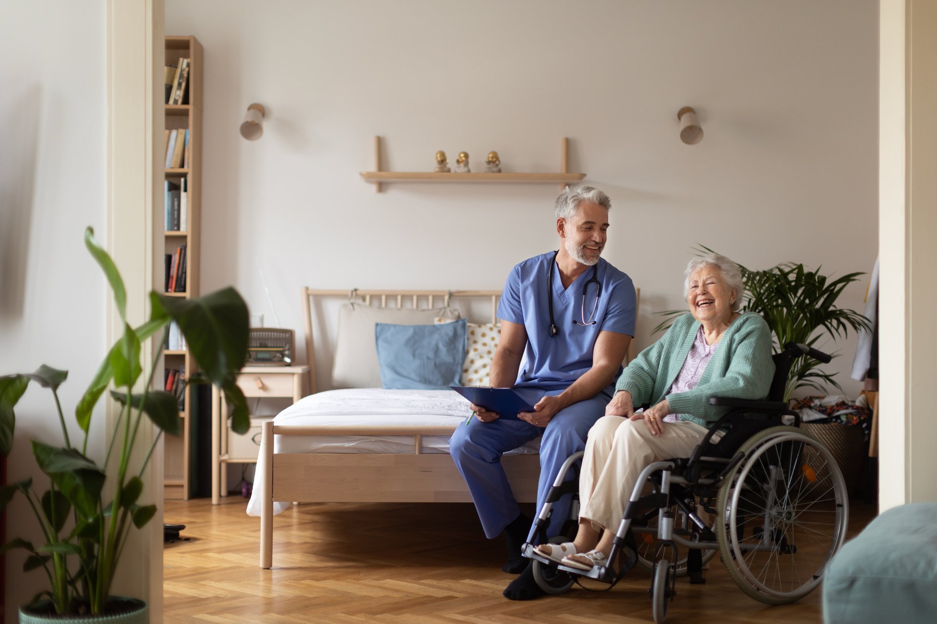 caregiver and senior woman in a wheelchair