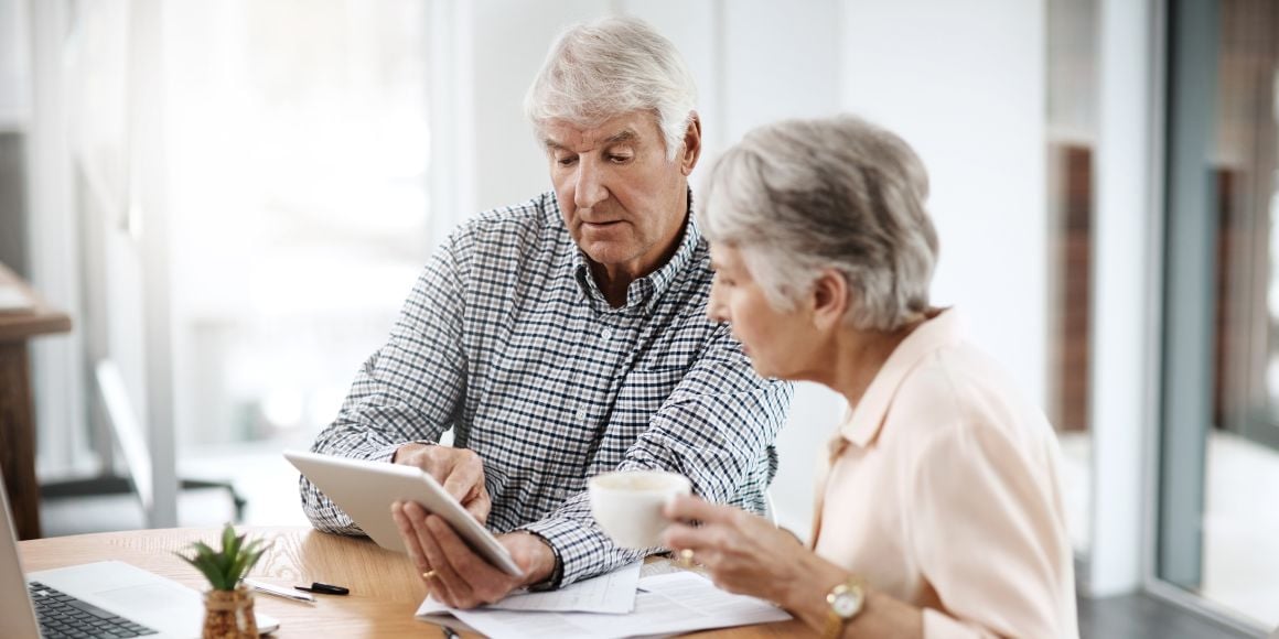 Man and woman with ipad