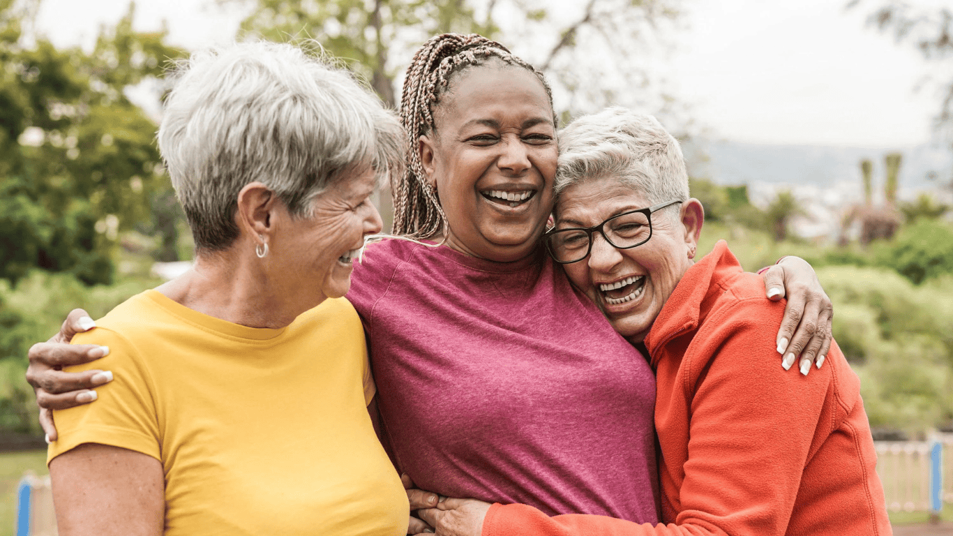 three seniors laughing