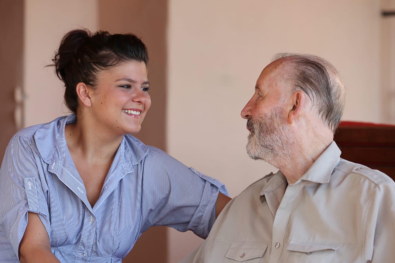 caregiver with a senior man