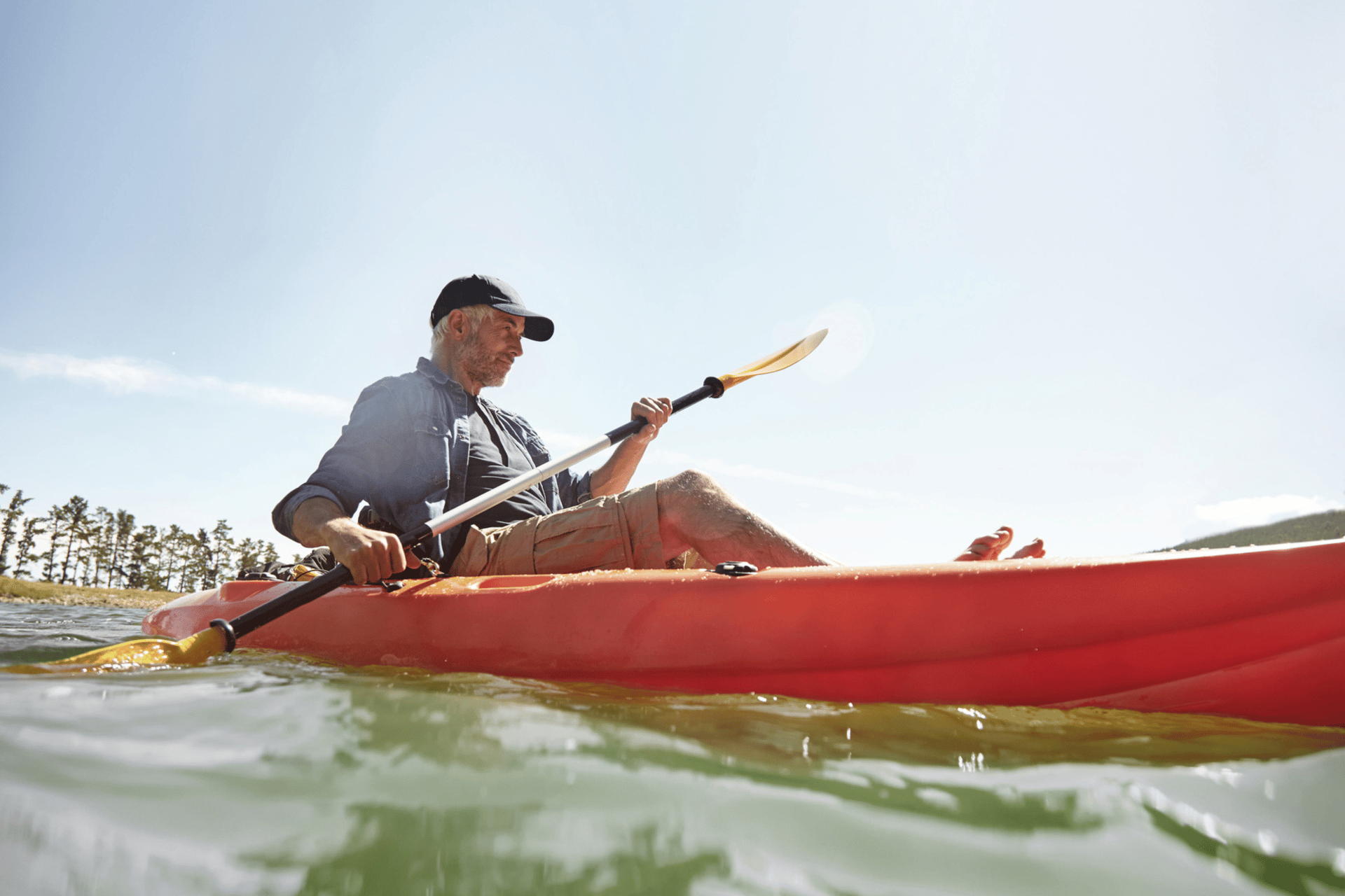 senior man in a canoe