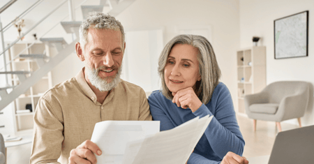 Older couple looking at papers